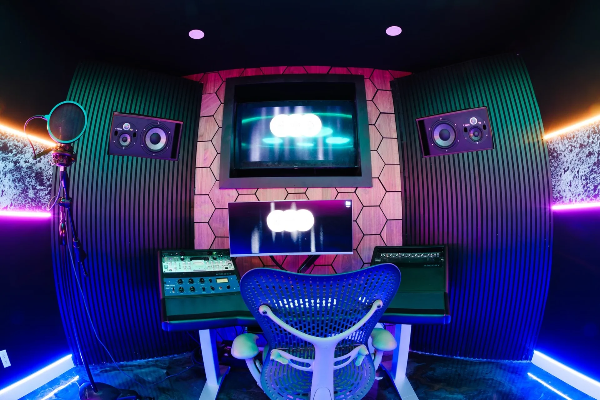 Studio B recording desk, microphone, displays, and monitoring position